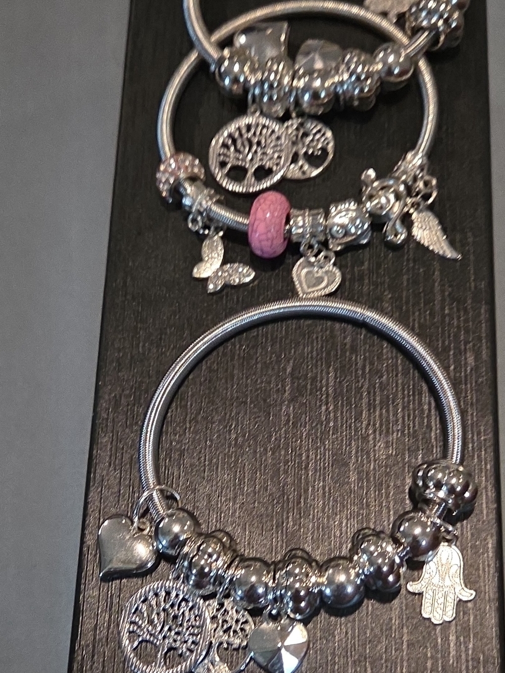 Silver Charm Bangle Bracelet with Pink Accent Bead